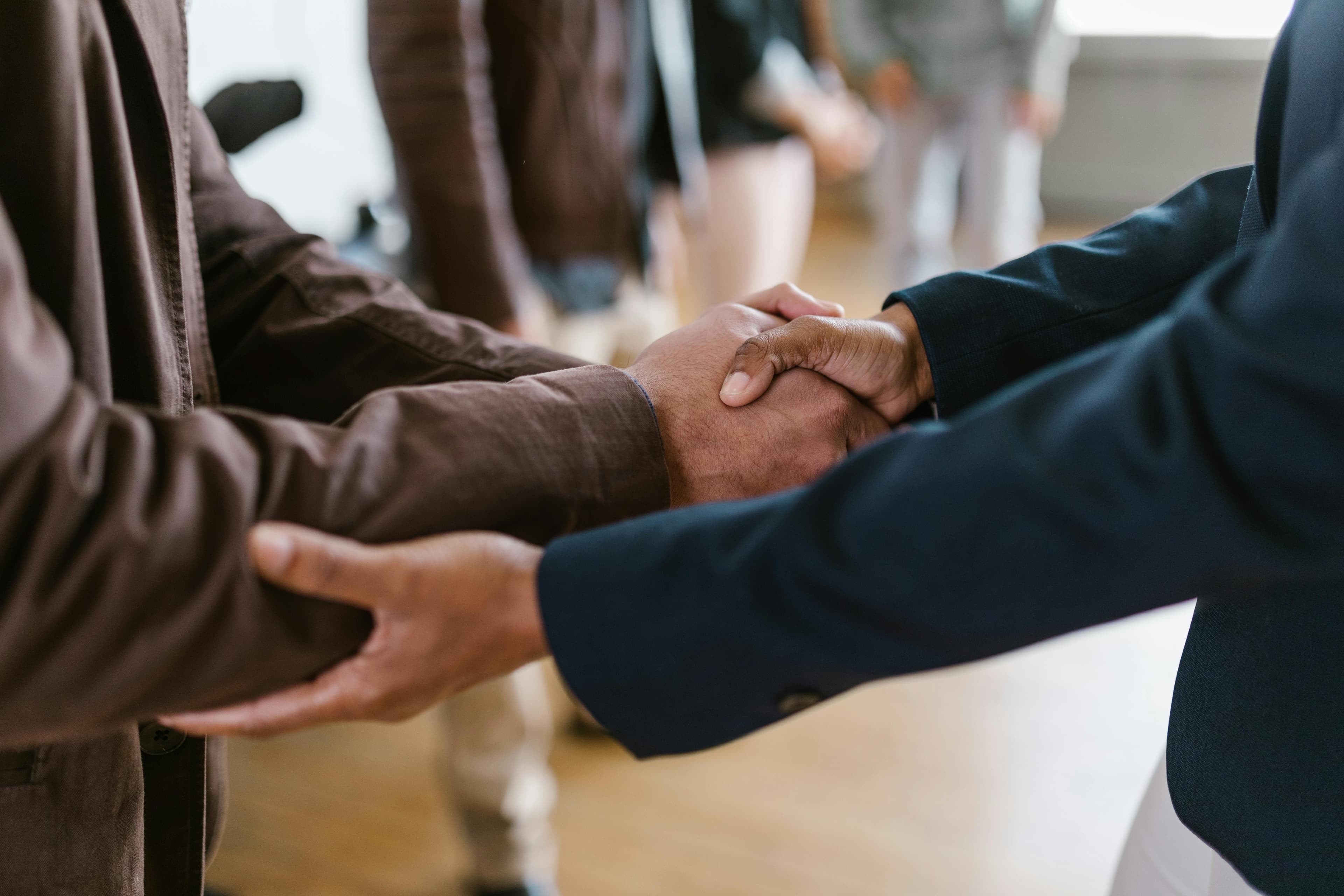 Business partners shaking hands